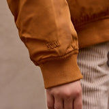 Padded bomber jacket with removeable hood
