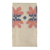 Knitted scarf with flower motif